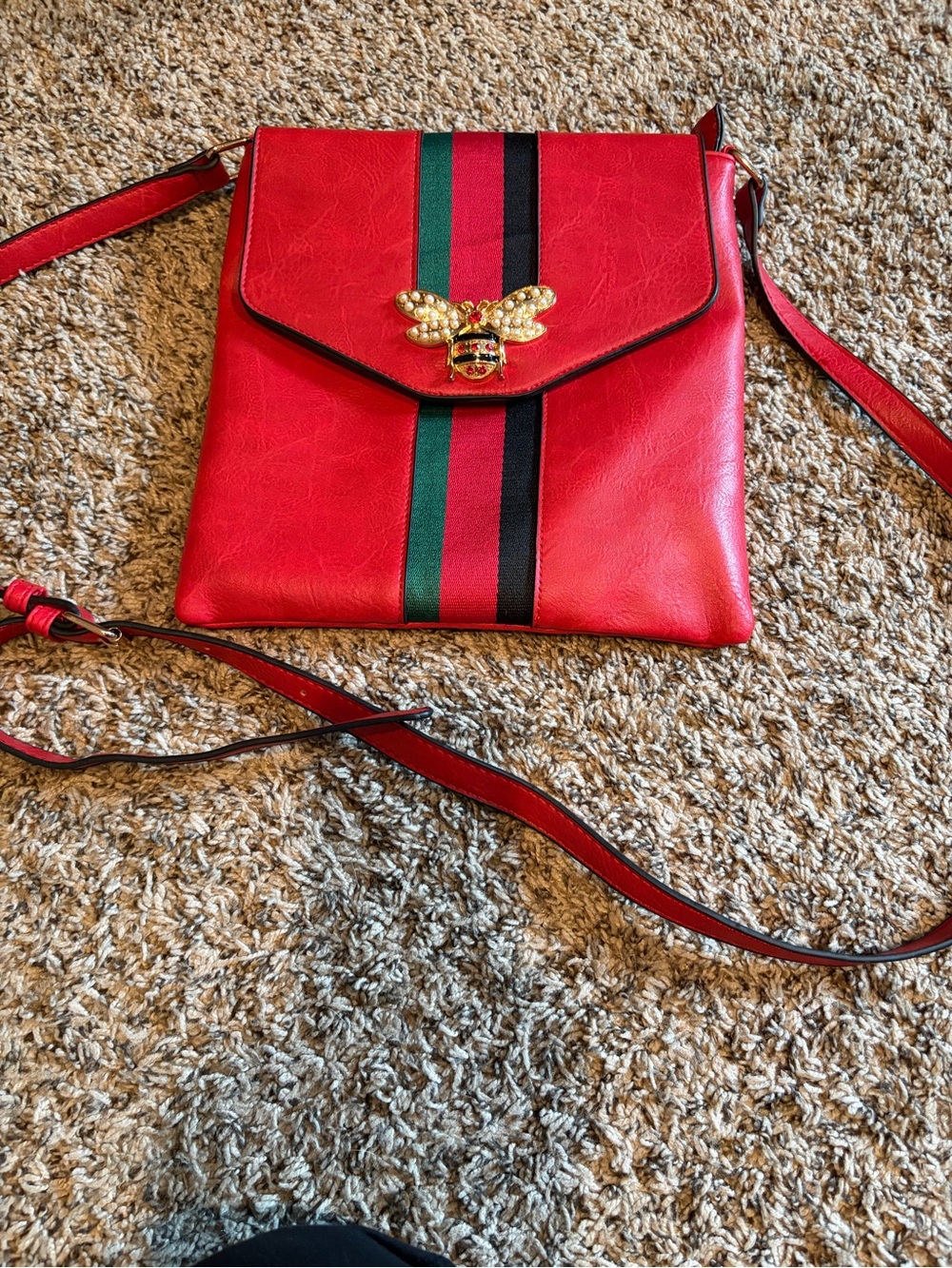 Red Crossbody Bag with Bee Emblem and Green-Black Stripe